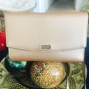 Kate Spade Rose gold cross body bag.
